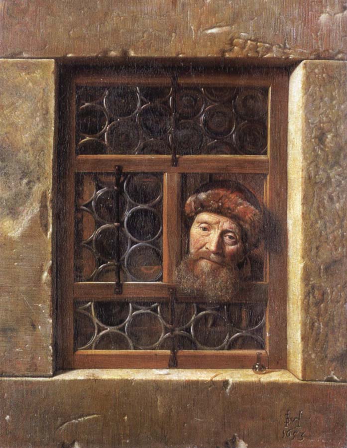 Man Looking through a window